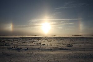Sun Dogs (Sunrise) - Formed when blowing snow at the ground level reflects the sun on two axis.