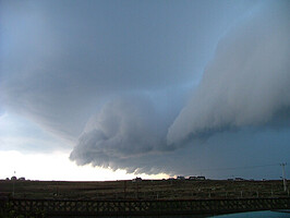 Shelf Cloud - A shelf cloud on the leading edge of a large CB that tracked South to North across the peninsula that I live on. The ensuing thunder storm destroyed the roof and one bedroom of a house a couple of villages away.