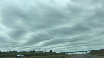 Unusual Clouds - Observed this between Denison and Sherman, Texas while headed south on Highway 75 on October 12, 2006