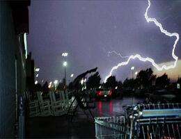 Severe Storm that pushed thru Owensboro 6 01 04 - I was standing outside Wal-Mart grabbing some pics when this bolt shot down!!