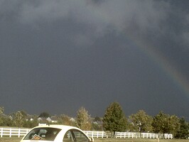 Funnel with rainbow. Here's the funnel with the rainbow attached that was part of the super cell that passed over us with emergency sirens blaring! We had several storms pass through two of em back to back, before The tornado hit later that evening! Things got pretty busy from around 3:30 pm on till late that night! Yep...I remember October 18, 2007. Brought back memories of Tornado 2000.