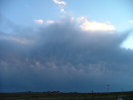 Mammatus Formation - This is viewed from my house looking East across the Minch, towards the Scottish mainland. The CB had the mammatus formation for quite a while, but by the time I got home and got the camera out then they were starting to dissipate. An unusual sight for us up here.