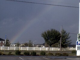 As the funnel passed by (Part A) - This is the left side of the rainbow near the funnel cloud.