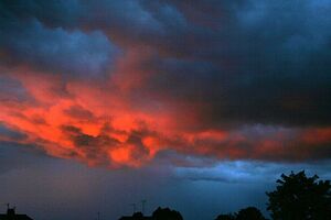 Severn Tales - Setting sun lights up clouds over Gloucester, UK